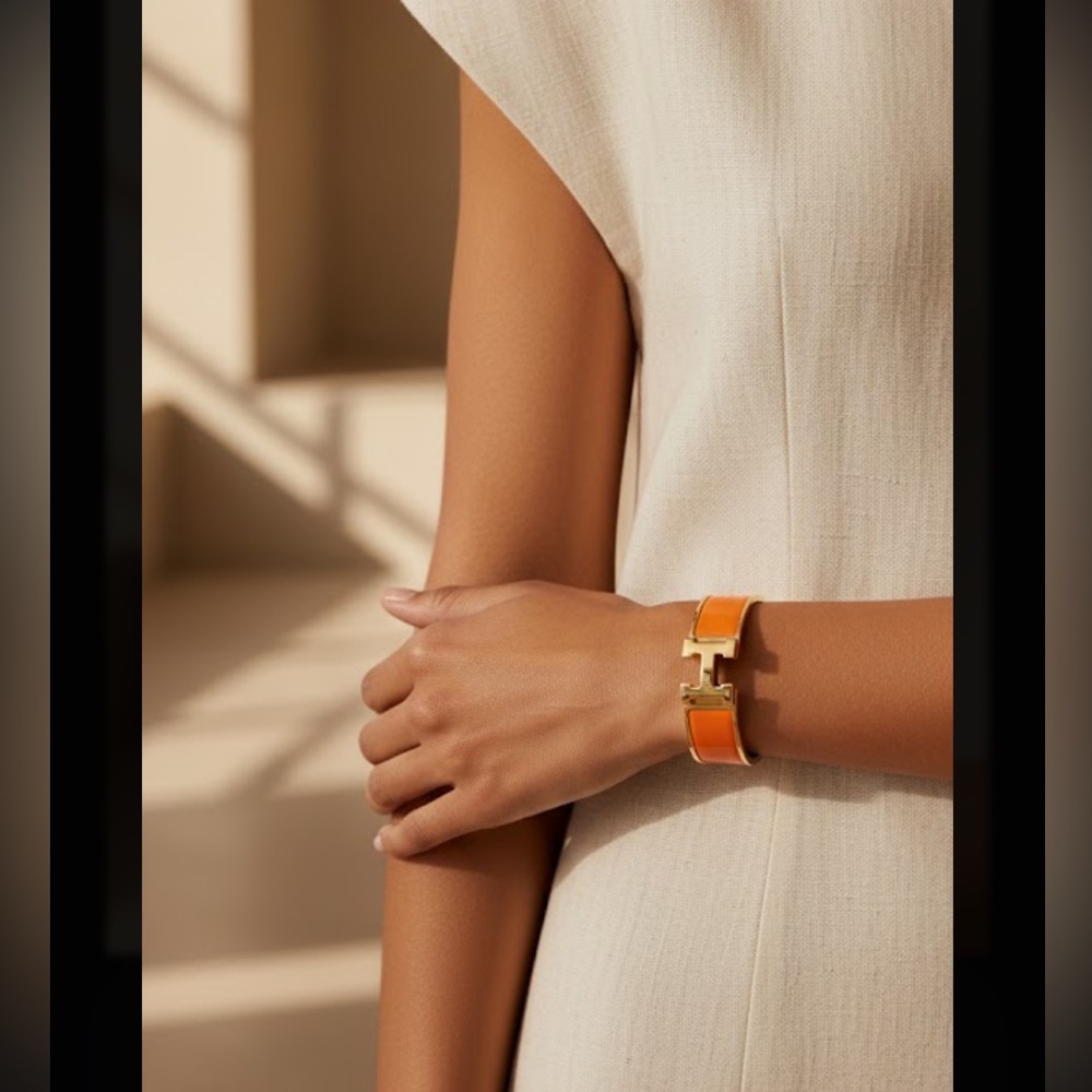 Hermes Clic Clac H bracelet in Orange FruitΓ©, size PM
